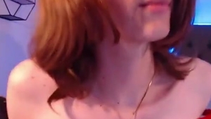 Redhead Transgirl In dark stockings Shows Off Her Little Butte